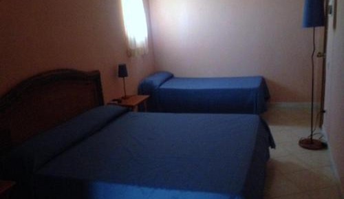 Quadruple Room with Private Bathroom