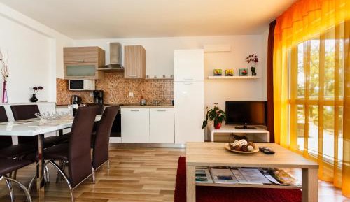 Executive Three-Bedroom Apartment with Balcony and Sea View