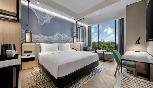 King Corner Room with Sofa Bed and City View