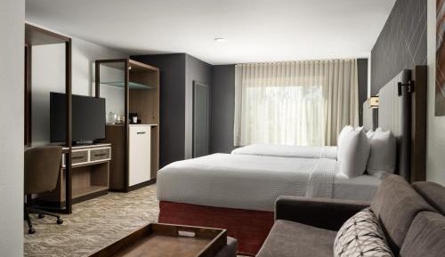 Queen Suite with Two Queen Beds and Sofa Bed