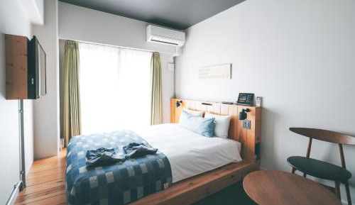 Queen Room with Balcony - Non-Smoking
