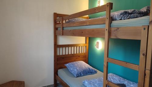 Single Bed in Dormitory Room