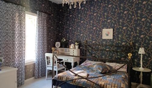 Quadruple Room with Shared Bathroom