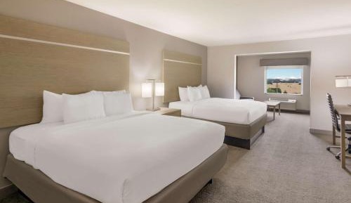 Queen Suite with Two Queen Beds and Sofa Bed