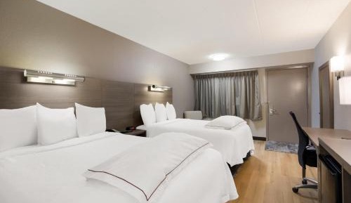 Premium Room with Two Double Beds Smoke Free (Upgraded Bedding & Snack)