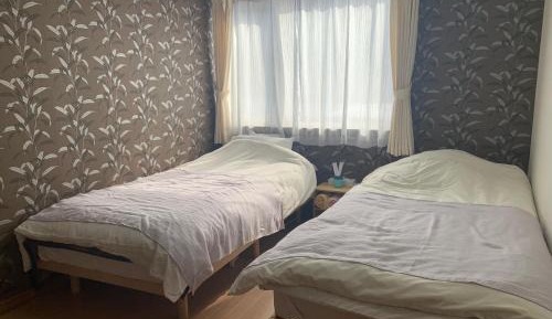 Twin Room with Shared Bathroom