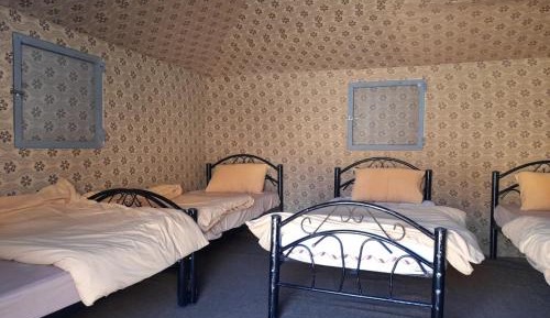 Quadruple Room with Shared Bathroom