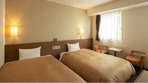 Twin Room with Extra Bed - Non-Smoking
