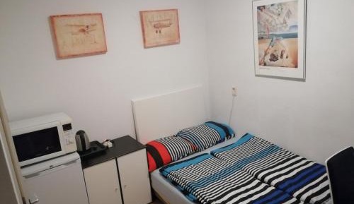 Quadruple Room with Private Bathroom