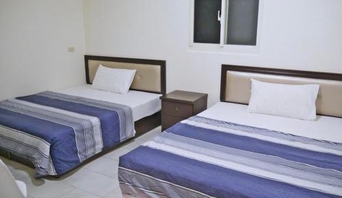 Quadruple Room with Private Bathroom
