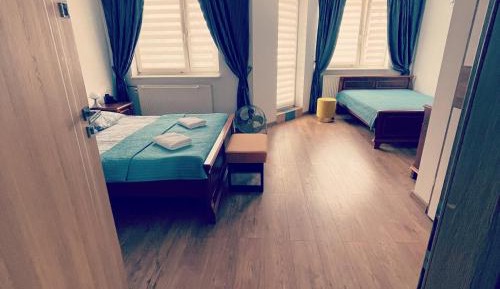 Quadruple Room with Private Bathroom