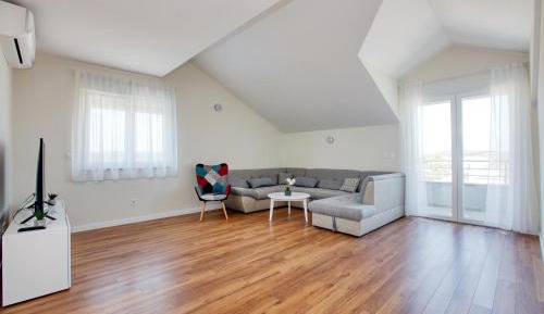 Three-Bedroom Apartment with Terrace and Sea View