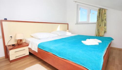 Three-Bedroom Apartment with Terrace and Sea View