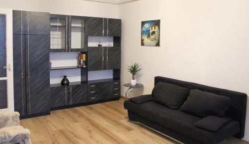 One-Bedroom Apartment with Balcony and City View