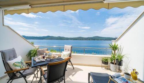 One-Bedroom Apartment with Balcony and Sea View