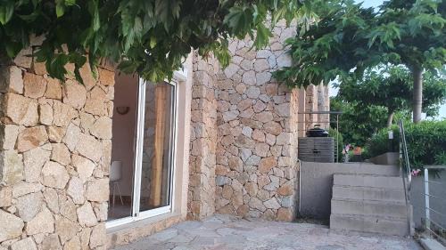 One-Bedroom Apartment with Sea View and Small Garden