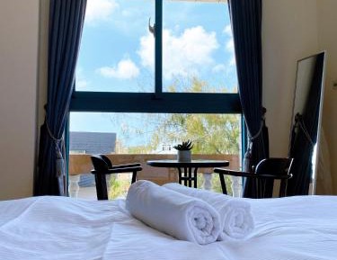 Queen Room with Shared Bathroom