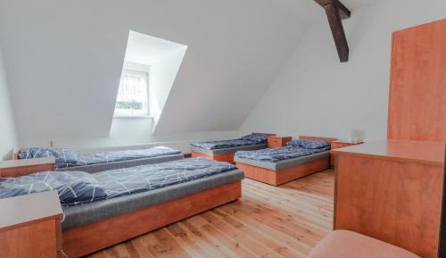 Single Bed in Dormitory Room