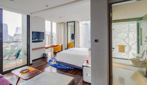 Standard Corner King Room with Balcony and Garden View