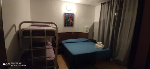 Quadruple Room with Balcony and Beach Access