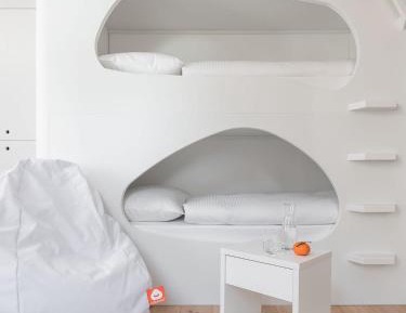 Multi-bed room with 4 capsule beds
