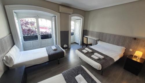 Family Room with Balcony and Shared Bathroom