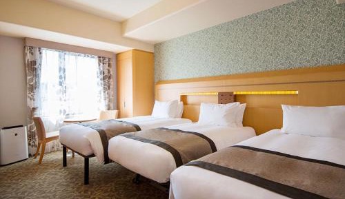 Twin Room with Extra Bed- Public Bath and Sauna