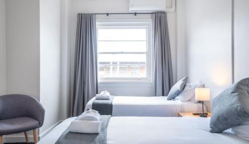 Queen Room with Shared Bathroom