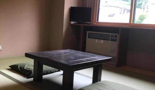 Single Room with Shared Shower and Toilet