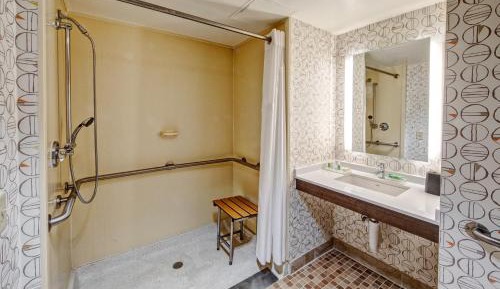 Standard Queen Room with Two Queen Beds and Mobility Accessible Roll-In Shower