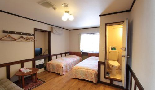 Twin Room with Private Bathroom and Sofa Bed