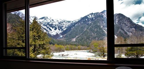 Japanese-Style Room with Mountain and River View