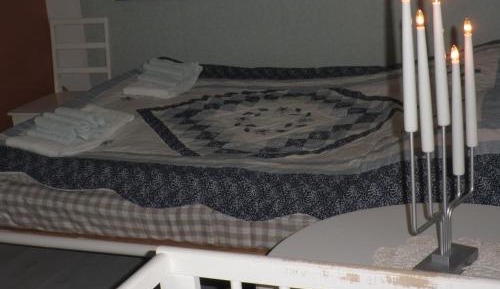 Quadruple Room with Shared Bathroom