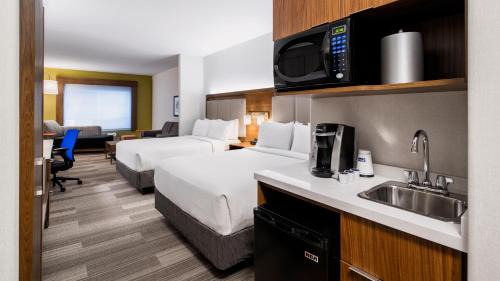 Queen Suite with Two Queen Beds and Sofa Bed