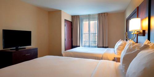 Queen Suite with Two Queen Beds and Sofa Bed
