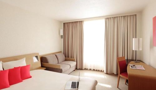 Standard Room with One Queen Bed and One Sofa Bed