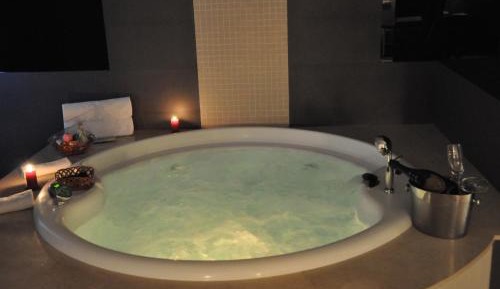 Suite with Hot Tub and Sauna