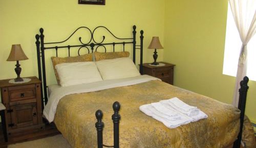 Queen Room with Shared Bathroom