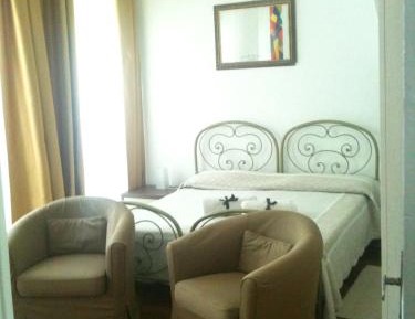 One-Bedroom Apartment with Balcony (2 Adults + 2 Children)