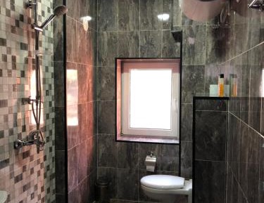 Quadruple Room with Private Bathroom