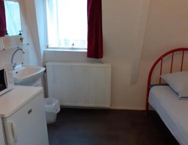 Single Room with Shared Shower and Toilet