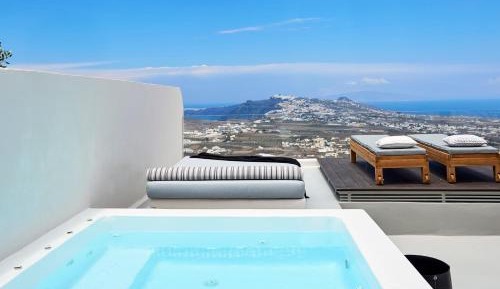 Two Bedroom Cave Suite with Outdoor Hot Tub and Panoramic Island View