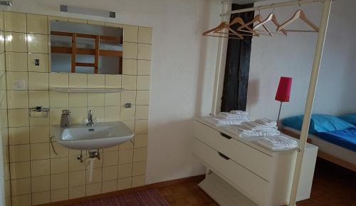 Quadruple Room with Shared Bathroom