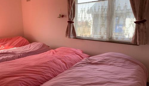 Quadruple Room with Shared Bathroom