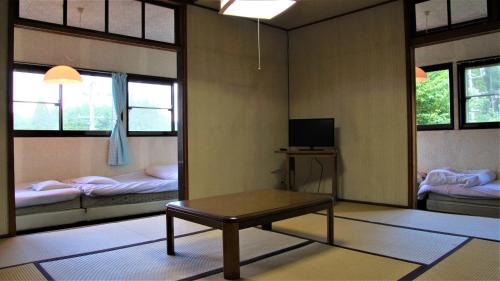 Quadruple Room with Shared Bathroom