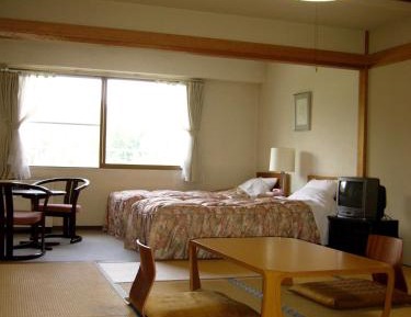 Japanese-Style Room with Tatami Area and Shared Bathroom