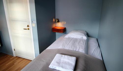 Basic Single Room with Shared Bathroom