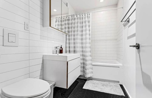 Chinatown Apartment | The Zen Loft: Shared Rooftop Bliss with City Views
