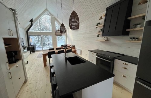 L'Anse-Saint-Jean Ski Chalet | Scandinavian chalet in the alpine village of Mont Édouard-Magnificent new construction