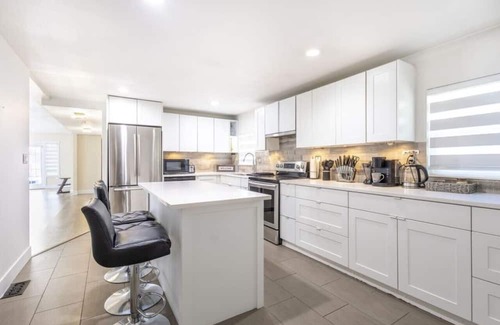 Abbotsford House | Spacious: Close to Airport ~ Pool ~ Hot Tub